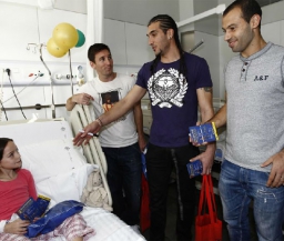Футболисты "Барсы" посетили каталонские больницы