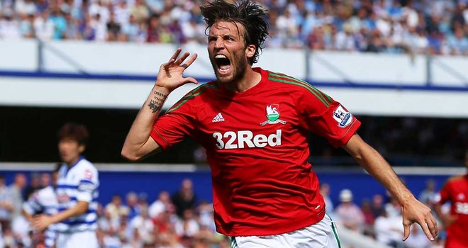 \"Анжи\" может предложить \"Суонси\" 18 млн евро за Мичу