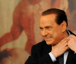 Берлускони: Постараемся привести в порядок финансы